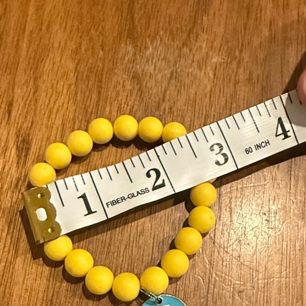 Yellow Beaded Kids Bracelet with Rainbow Charm